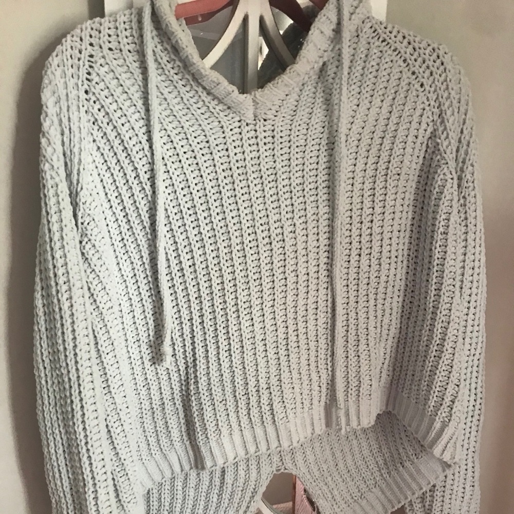 light blue sweater